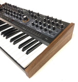 Handcrafted walnut side panel upgrade for Sequential Take 5 synthesizers, featuring premium wood panels hand-treated with tung oil. Elevate your synth with a vintage-inspired look using SynthCraft's exquisite customization options.